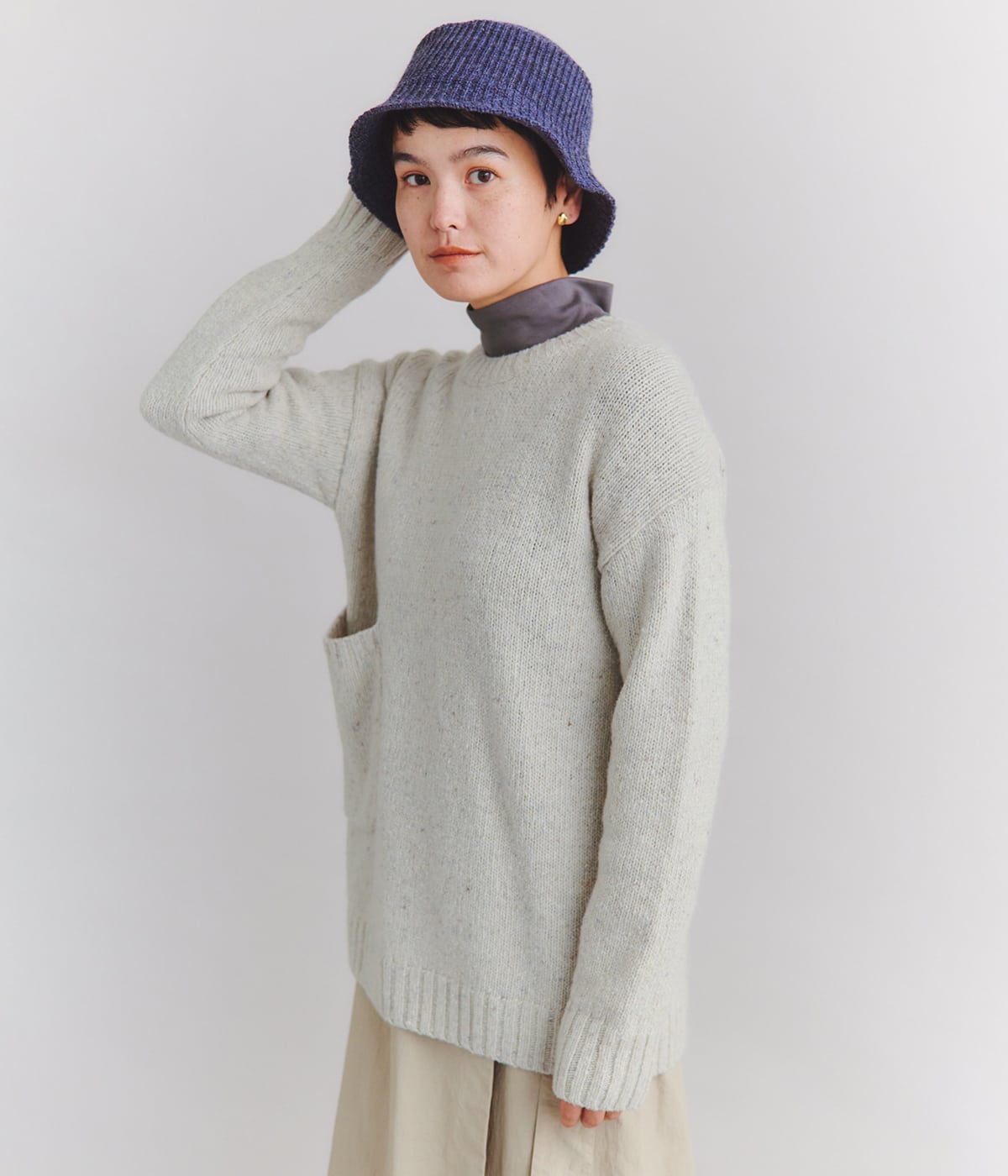 NEWYORKERのLow Gauge Nep Knit アシンメトリーパッチポケットニット