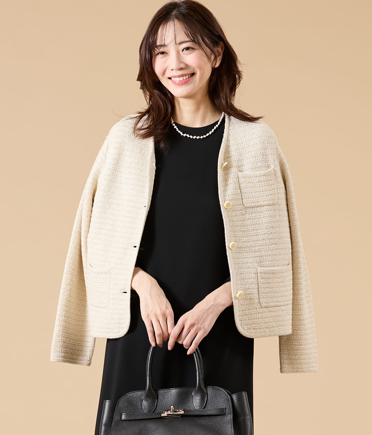 ツィーディーラメ ノーカラーニットジャケット